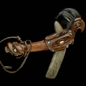 Club made from yew wood depicting Thunderbird with inlaid operculum shells and sea otter teeth, collection by Captain Cook on his third voyage 1776-1780 in Nootka Sound, British Columbia Canada. © The Trustees of the British Museum
