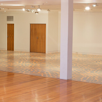 Folly (stone carpet), exhibition view. Courtesy of Dunedin Public Art Gallery