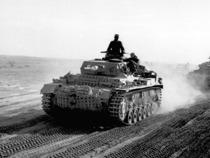 German Panzer III of the Afrika Korps advancing across the North African desert, April-May 1941