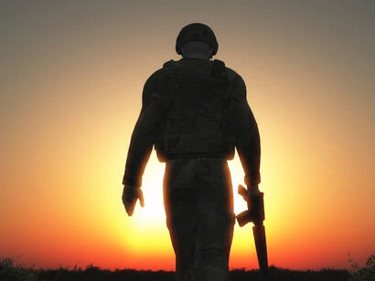 Armed and faceless, the soldier embodies the system of power and violence that Ramparts Magazine associated with American imperialism