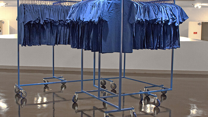 Mike Calway-Fagen, What’ll we do about names, 2014, T-shirts, hangers, steel, wheels, hardware