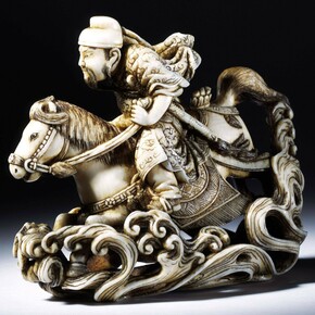 Netsuke of the Chinese General Gentoku riding across a river, carved ivory, signed Rakueisai, ca. 1850 – 1900, Japan. Museum no. A.781-1910. © Victoria and Albert Museum, London