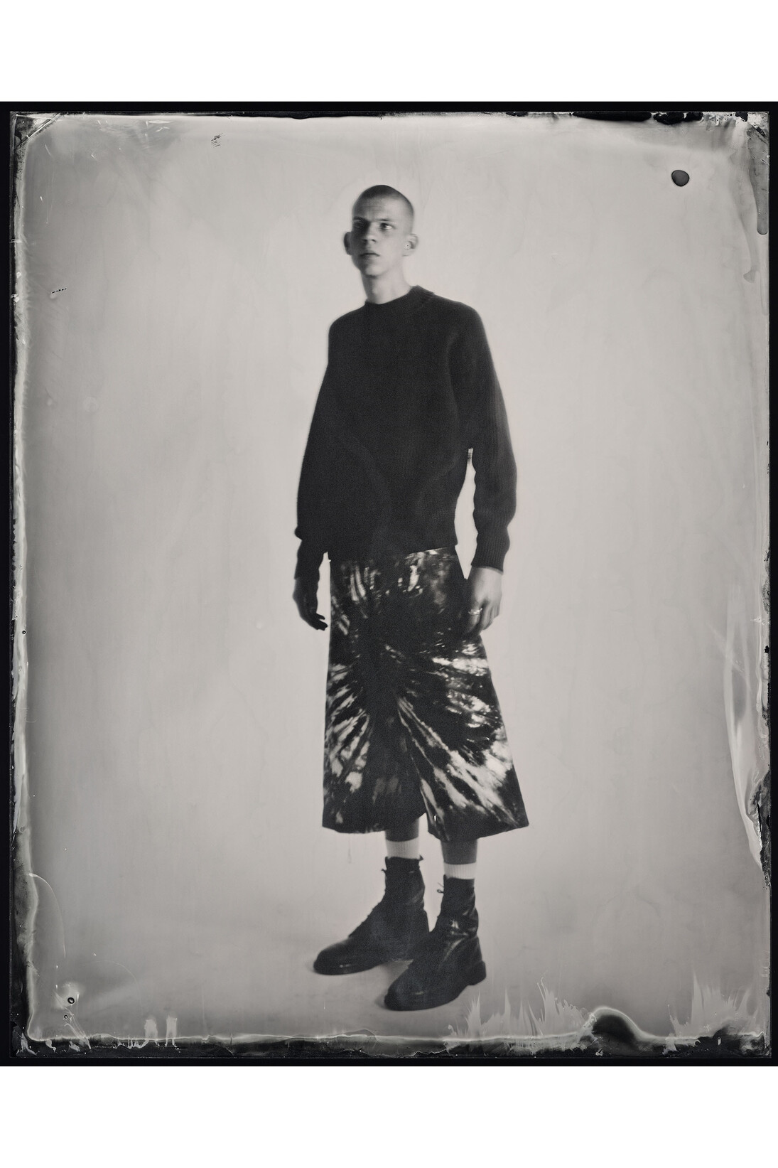 Kasia Wozniak, Wet plate collodion Ambrotype, Inspiration from the pages of Sherlock Holmes: “Don't you remember the amateur who fought three rounds with you …?” [The Sign of the Four by Arthur Conan Doyle] “Next he drew forth a pair of boots.” [The Valley of Fear by Arthur Conan Doyle], Fashion credits: Jumper: boxing instructor (archive); Trousers: Craig Green; Boots: Dr. Martens, © Kasia Wozniak/Museum of London