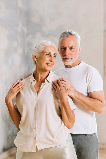 A happy, affectionate elderly couple enjoying their journey of healthy aging and deep connection