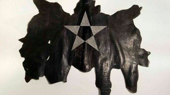 Gilberto Zorio, Aluminium Star on Skin, 2006, Cow skin, aluminium, 400 x 330cm, Image Courtesy of the Artist and Blain|Southern