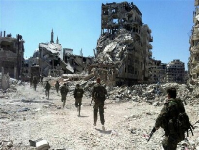 Soldiers patrolling in Homs