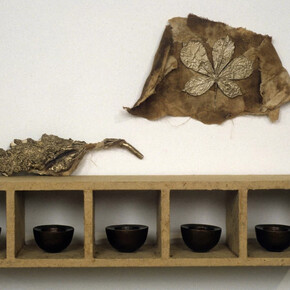 Esca, 1997, polished patinated bronze, horse-chestnut seeds, bali-paper, cloth, wood, 33 x 61.6 x 13.7 cm, 13 x 24 1/4 x 5 3/8 ins © Michelle Stuart