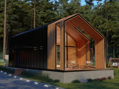 Wooden tiny house exterior set against a forest background, highlighting the design of prefabricated buildings and factory-built modules in prefab architecture