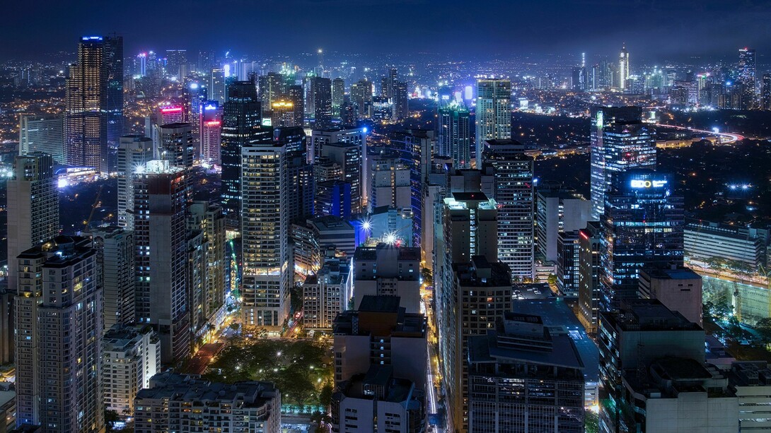 Through ethnographic research in Tondo, sociologist Marco Garrido explains how the drug war was supported because drug-related disorder directly threatens the fragile livelihoods and communal survival of urban communities. Makati City lights, Metro Manila, Philippines