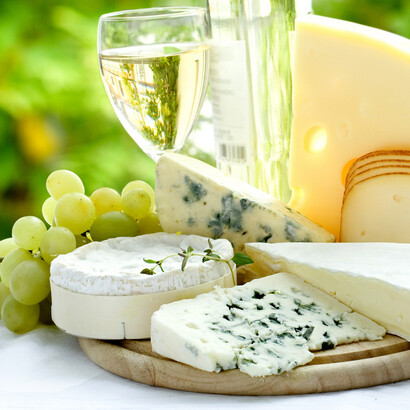 White wine and Gorgonzola and Camembert cheese