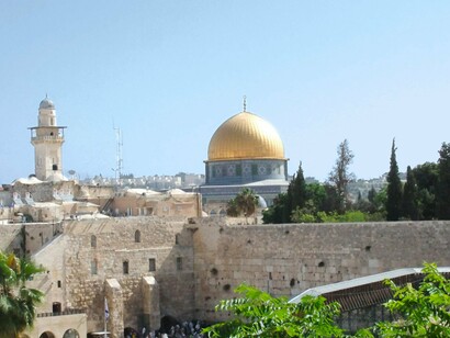 The Western Wall and Dome of the Rock stand side by side, embodying the layered religious claims that continue to fuel a territorial and political conflict