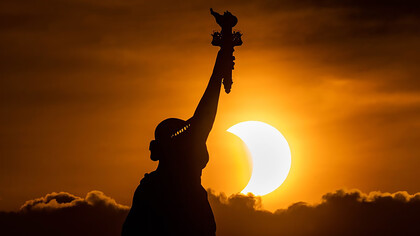 Statue of Liberty, annular solar eclipse, New York, United States
