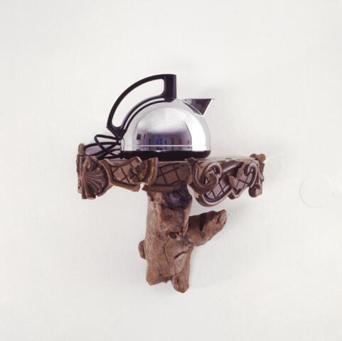 Haim Steinbach, Shelf with Kettle, 1981, Imitation plastic wood shelf with driftwood; 1950's chrome Kettle, 12 x 17 x 17 inches; 30.5 x 43.2 x 43.2 cm. Courtesy the artist and Tanya Bonakdar Gallery, New York
