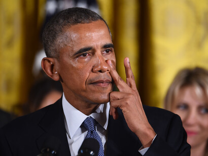 President Obama mourns after a massacre at a school