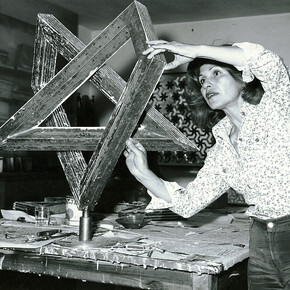 Monir Shahroudy Farmanfarmaian in her studio working on Heptagon Star, Tehran, 1975. Photo: Courtesy of the artist and The Third Line, Dubai