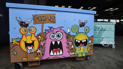 An artistically designed giant dumpster 