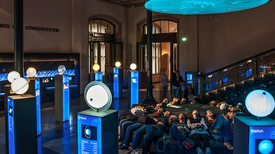 The Cosmos and the Solar System. Courtesy of Museum für Naturkunde