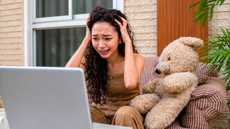 A young woman sits anxiously, realizing she has been drawn into a multilevel marketing scheme