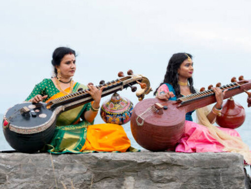 By the shores of Lake Ontario in Toronto, Canada, two girls perform a veena duet, filling the air with melodious music