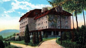 A postcard depicting the approach to the Grove Park Inn from the south entrance, Asheville, North Carolina