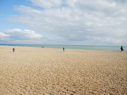 People at Hastings beach, England 