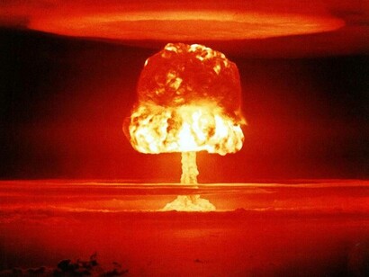 A nuclear explosion as seen from a distant at sunset