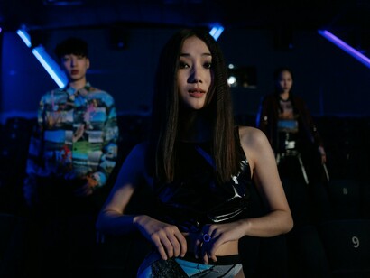 A contemporary street-fashion look with futuristic undertones, reflecting the trend-driven world of Korean pop style