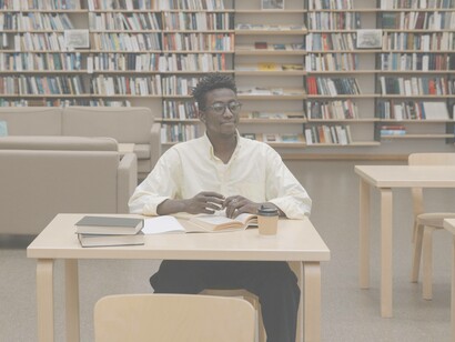 Man sitting in a library
