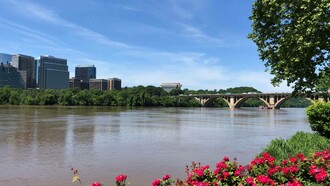 A view of Georgetown and the Potomac River on a sunny day. Photo by Jamie Edwards