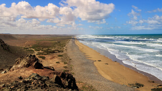 Seaside resorts programmed in the Sahara, include Guelmim Plage Blanche
