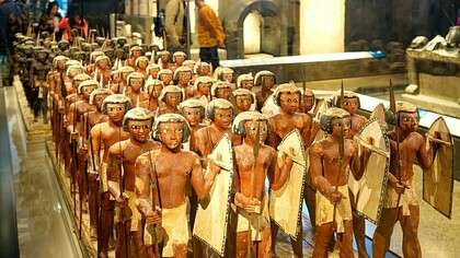 Wooden model soldiers from the tomb of Mesehti in Asyut, displayed at the Grand Egyptian Museum in Egypt