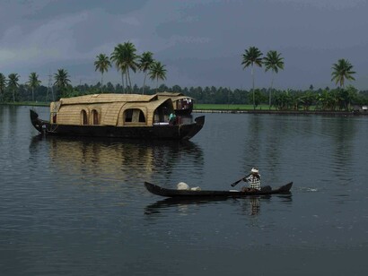 Kettuvallams, gliding past in the Shimmering Lake waters