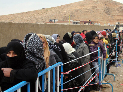 Retahila de mujeres sirias refugiadas