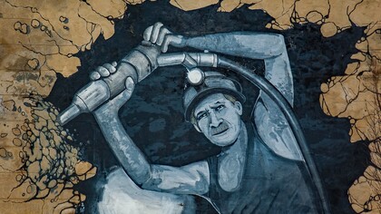 Mural que ilustra el trabajo de un minero