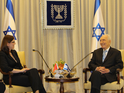 Tamara Mugosa, Montenegro Ambassador to Israel (non-resident) speaking with former Israeli President Shimon Peres at the President's Residence, Jerusalem. Photo by Carrie Hart
