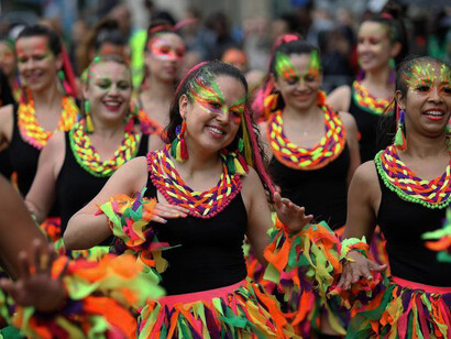 Brightly dressed performers
