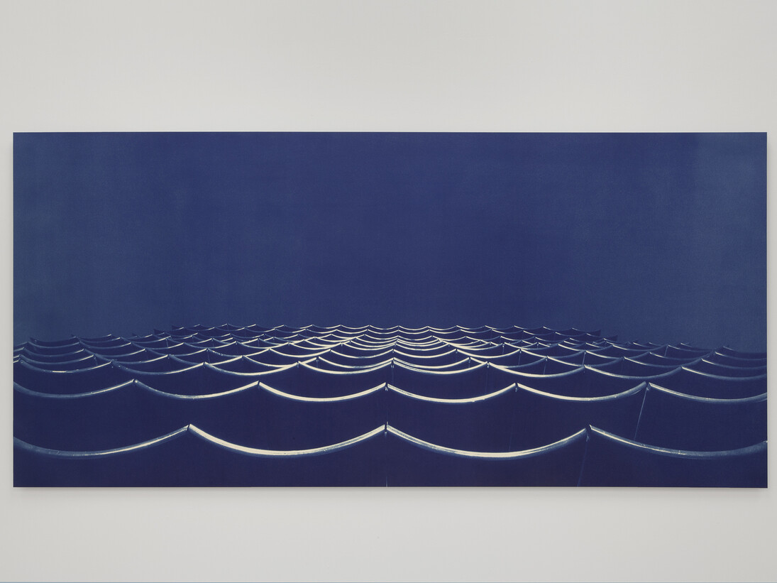 Bridget Smith, Blueprint for a Sea (series), 2015, four cyanotype prints on aluminium, five opaline globe lights, Courtesy Focal Point Gallery, Photo: Manuela Barczewski
