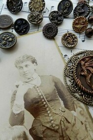 Old buttons on a score