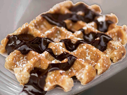 Belgium waffles drizzled with chocolate sauce