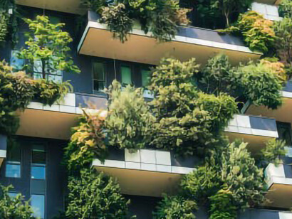 Amidst a verdant backdrop, sustainable architecture takes center stage, as a building adorned with thriving greenery exemplifies the perfect fusion of environmental consciousness and visual appeal