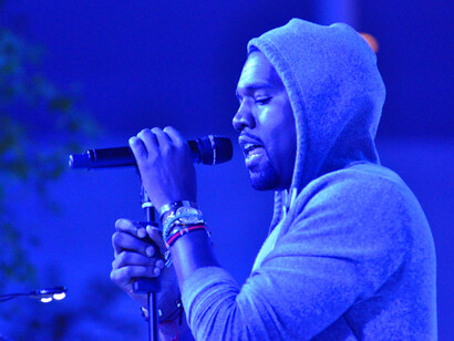 Kanye West delivers a dramatic mountain-top performance at the Verizon Center in Washington, D.C., during The Yeezus Tour on November 21, 2013