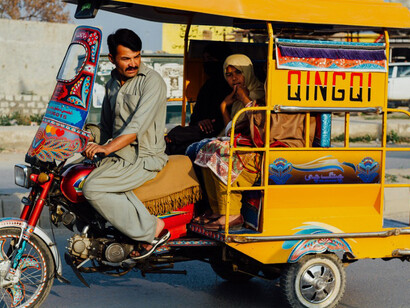 Tourists and locals enjoy a rickshaw ride in Chakwal, near Lahore, Pakistan