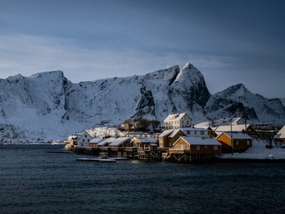 Traditional waterfront buildings in Lofoten Islands, Norway, symbolising resilient construction adapted to freezing temperatures and coastal weather