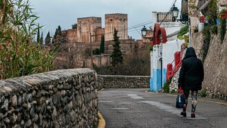 Man roams the streets of Grenada, Spain