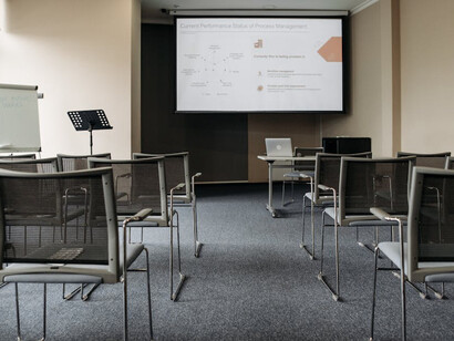 The unoccupied chairs of the empty conference room represent the WSF's identity crisis and history of failed reforms and discord