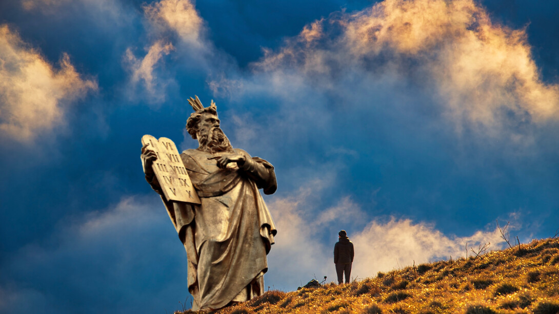 A statue of Moses with the ten commandments