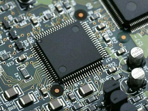 A high-tech circuit board featuring advanced semiconductor components, representing the transition from trade wars to technology wars