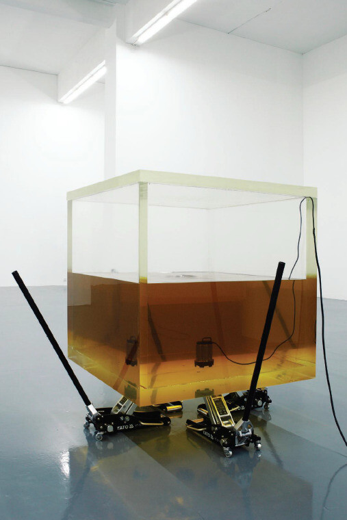 Ran Huang, The Weakness of Will and the Fear of Society, 2012, Acrylic Tank, Oil, Electronic Water Pump, Floor Jack, 150 x 120 x 120 cm, Installation View, Disruptive Desires, Tranquillity and the Loss of Lucidity, Long March Space, Beijing, China, 2012
