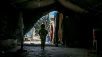 Child in a temporary shelter