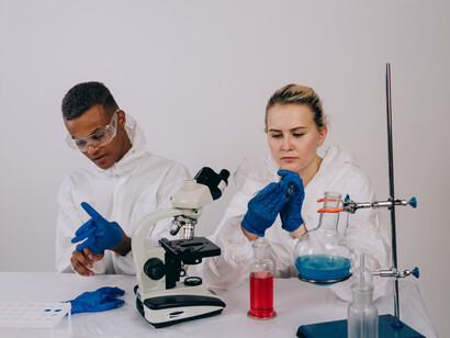 The scientists remove their gloves after performing their research on the liquids